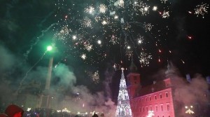 Fireworks explode in the sky above the Royal Castle during the New Year's Eve celebrations in Warsaw, Poland.